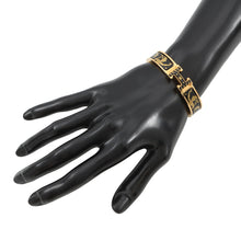 Load image into Gallery viewer, HERMES ClicH Drawn in by the charm of Orpheus Size PM Black/Gold Metal Enamel