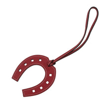 Load image into Gallery viewer, HERMES Paddockfaire Cheval Horseshoe Bag Charm Rouge Grenat Swift Leather