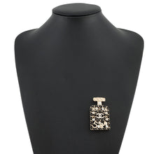 Load image into Gallery viewer, CHANEL Perfume motif brooch Gold Plated Leather