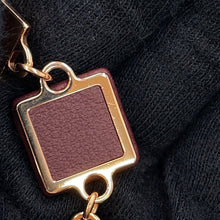Load image into Gallery viewer, HERMES Disco Fauve Earrings Bordeaux Metal Swift Leather