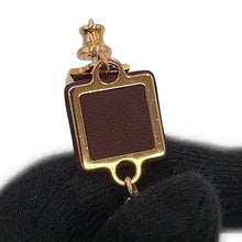 Load image into Gallery viewer, HERMES Disco Fauve Earrings Bordeaux Metal Swift Leather