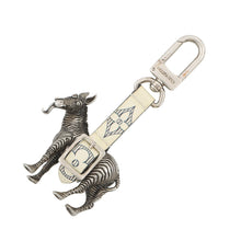 Load image into Gallery viewer, LOUIS VUITTON Chapman Zebra Bag Charm Silver/White PVC
