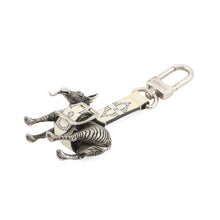 Load image into Gallery viewer, LOUIS VUITTON Chapman Zebra Bag Charm Silver/White PVC