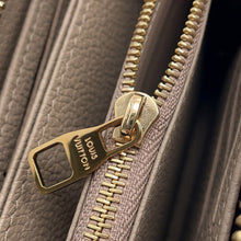 Load image into Gallery viewer, LOUIS VUITTON Zippy Wallet TourterelleM69034 Monogram Empreinte Leather