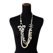 Load image into Gallery viewer, CHANEL CC Logo Ribbon Motif Necklace Metal Rhinestone Faux Pearl