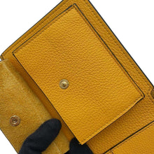 将图像加载到图库查看器中，GUCCI Embossed Logo Bifold Wallet Yellow658681 Leather
