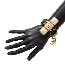 Load image into Gallery viewer, CHANEL Gripoa Bracelet Black/White/Gold Metal
