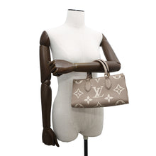 Load image into Gallery viewer, LOUIS VUITTON OnthegoEW Tourterelle/ClaimM23641 Monogram Empreinte Leather Size EW
