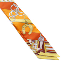 Load image into Gallery viewer, HERMES Scarf Twilly BRIDES ET GRIS GRIS Bridle and Bag Charm Orange/Jaune/RoseH062849S Silk 100%
