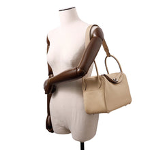 Load image into Gallery viewer, HERMES Lindy Trench/Etoupe Taurillon Clemence Size 26
