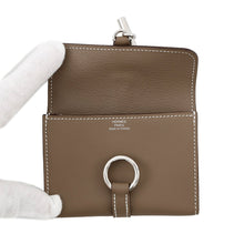 Load image into Gallery viewer, HERMES Glennan Compact Wallet Etoupe Swift Leather/Chevre Myzore Goatskin
