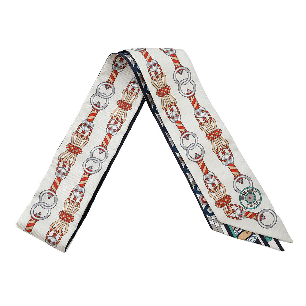 HERMES Twilly Scarf, Harnais en Rosace Creme/Ciel/Ochre Silk 100%