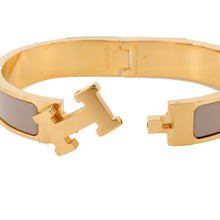 Load image into Gallery viewer, HERMES Clic・Crack Size PM Marong rasse Enamel Gold Plated
