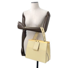 Load image into Gallery viewer, LOUIS VUITTON City Frame YellowM52719 Taiga Leather
