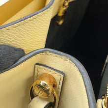 Load image into Gallery viewer, LOUIS VUITTON City Frame YellowM52719 Taiga Leather
