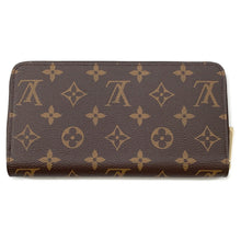 Load image into Gallery viewer, LOUIS VUITTON Zippy Wallet FuchsiaM41895 Monogram
