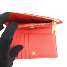 Load image into Gallery viewer, Bottega Veneta Maxi INTRECCIATO Cassette Bi-fold Wallet Orange Leather
