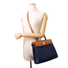 Load image into Gallery viewer, HERMES Herbag zip Navy/Natural Toile H Vache Hunter Leather Size PM
