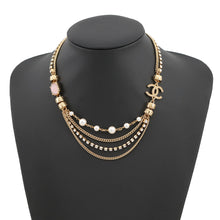 Load image into Gallery viewer, CHANEL CC Logo Stone Crush Chain Logo Necklace Gold Gold Plated Rhinestone Faux Pearl
