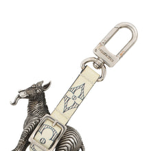 Load image into Gallery viewer, LOUIS VUITTON Chapman Zebra Bag Charm Silver/White PVC
