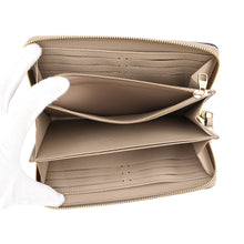 Load image into Gallery viewer, LOUIS VUITTON Zippy Wallet TourterelleM69034 Monogram Empreinte Leather
