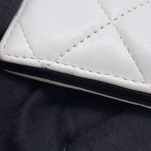 Load image into Gallery viewer, CHANEL Matelasse Chain Wallet Double Face Black/White Lambskin
