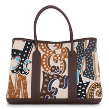 Load image into Gallery viewer, HERMES Garden Party Electric Caramel/Ecru/Beige/Ebene Toile H Negonda Leather Size PM
