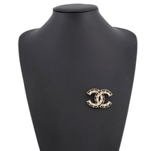 Load image into Gallery viewer, CHANEL CC Logo Brooch Black/White Gold Plated Leather
