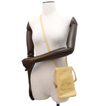 Load image into Gallery viewer, CELINE Drawstring Mobile Pouch Cuir Triomphe Yellow 10L163ETK Lambskin
