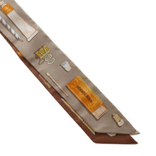 Load image into Gallery viewer, HERMES Twilly In the Pocket Beige/Orange/Sable Silk100%
